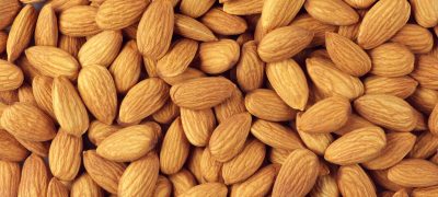 Almonds close-up Pile of almonds close-up as background.